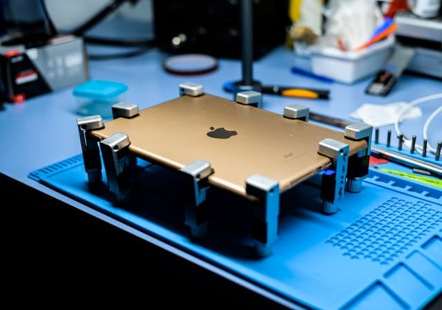 Technician repairing electronic device